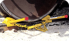 4011-05 Rail Chocks 
B-2 Type Wheel Chock with tightener and padlock
Exposed Rail. Weight 16 lbs